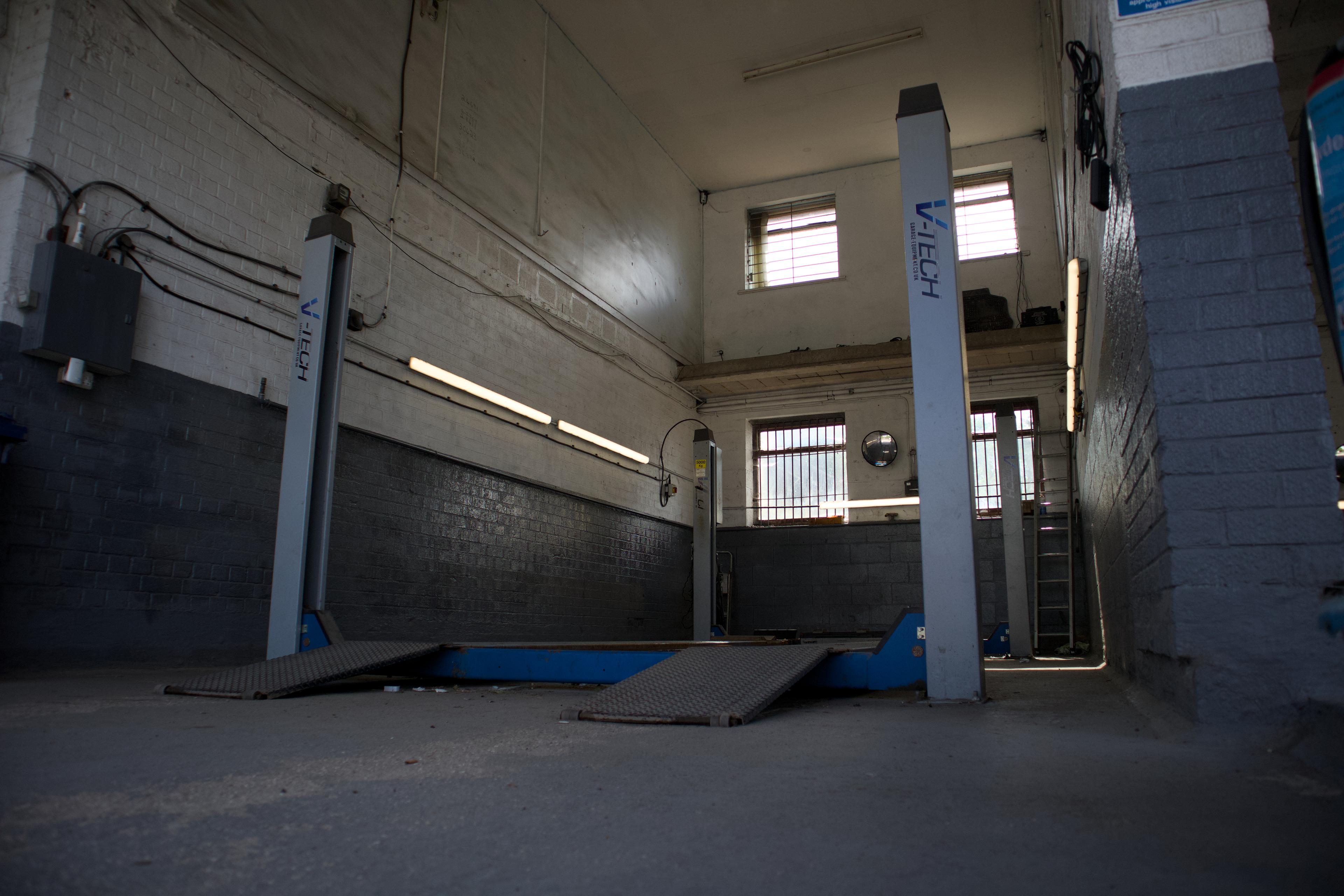 MOT testing bay with vehicle lift
